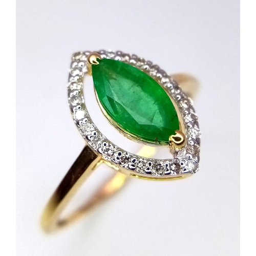 384 - A 14K Yellow Gold, Emerald and Diamond Ring. A 1.3ct emerald centre stone with 0.14ctw of diamond ac... 