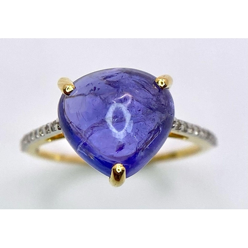 508 - A 14K Yellow Gold Tanzanite Ring. 5ct central tanzanite with 0.10ctw of diamond accents. Size M. 2.6... 