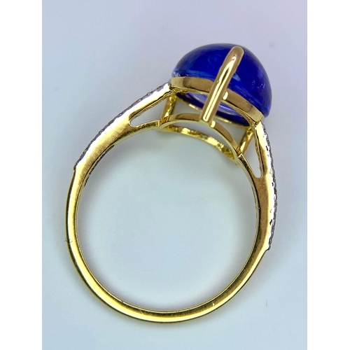 508 - A 14K Yellow Gold Tanzanite Ring. 5ct central tanzanite with 0.10ctw of diamond accents. Size M. 2.6... 