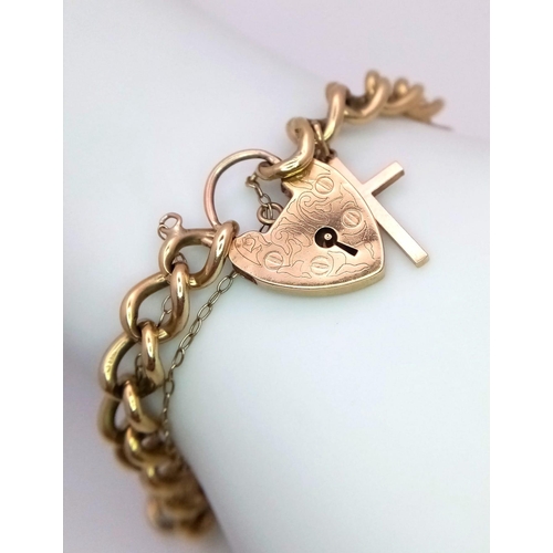 57 - 9k yellow gold charm bracelet.
19.5g, approximately 18cm length.

SH1284I