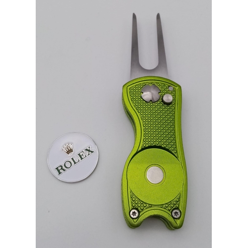 570 - A Rolex Branded Golf Putting Green Divot Repair Tool with Removable Ball Marker. Flick blade design!... 