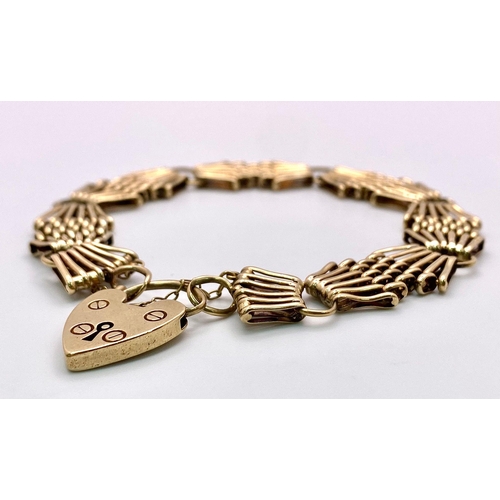 64 - 9k yellow gold gate bracelet.
18.4g, approximately 20cm length.

SH1283I