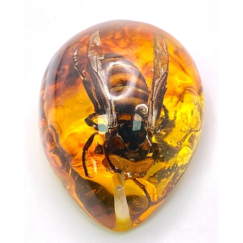 669 - A Monstrous Asian Hornet Trapped in Amber Resin - Pendant or Paperweight. 6cm