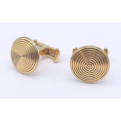 738 - A Pair of Designer Theo Fennell 18K Yellow Gold Spiral Cufflinks. 12.2g total weight. Ref: 15258