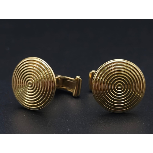 738 - A Pair of Designer Theo Fennell 18K Yellow Gold Spiral Cufflinks. 12.2g total weight. Ref: 15258