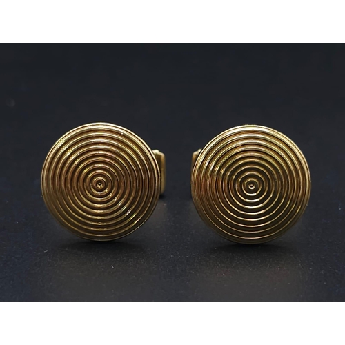 738 - A Pair of Designer Theo Fennell 18K Yellow Gold Spiral Cufflinks. 12.2g total weight. Ref: 15258