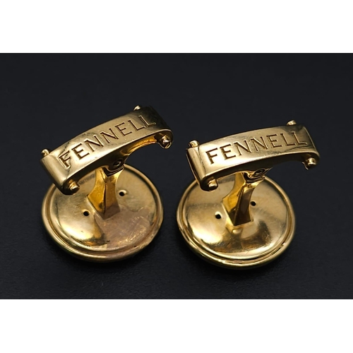 738 - A Pair of Designer Theo Fennell 18K Yellow Gold Spiral Cufflinks. 12.2g total weight. Ref: 15258