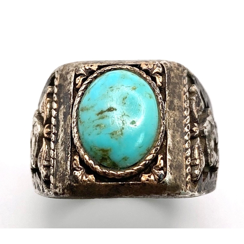 76 - A vintage 925 silver Turquoise solitaire gent ring. Total weight 14.8G. Size W. Please see photos fo... 