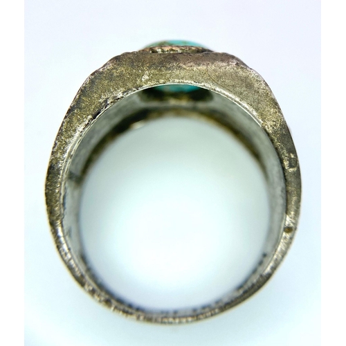 76 - A vintage 925 silver Turquoise solitaire gent ring. Total weight 14.8G. Size W. Please see photos fo... 