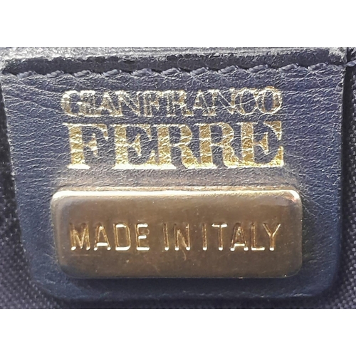 1123 - Vintage Gianfranco Ferre Bag.
A large, blue leather bag with gold tone hardware. Measures 39cm wide ... 