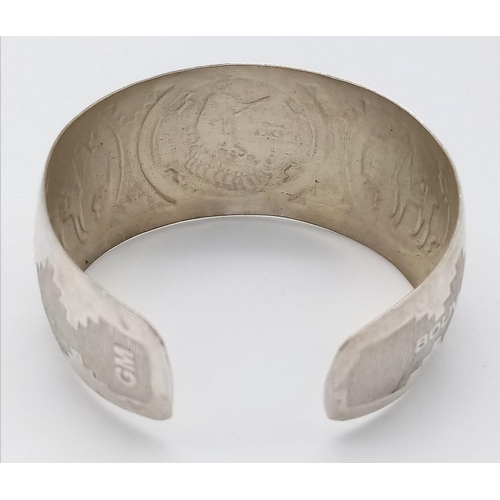 126 - A Bolivian silver cuff bangle with nicely engraved. Total weight 14.2G. Please see photos for detail... 