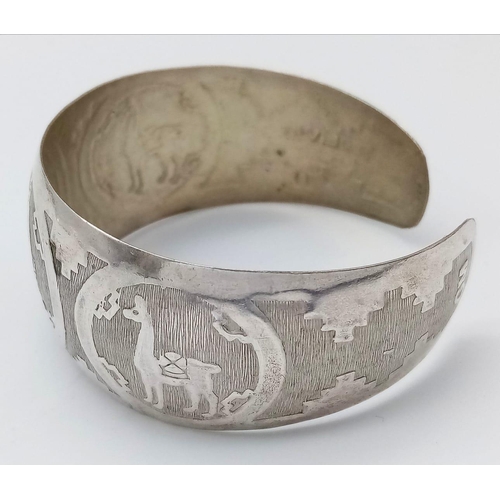 126 - A Bolivian silver cuff bangle with nicely engraved. Total weight 14.2G. Please see photos for detail... 