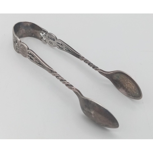 244 - An Antique sterling silver tong with unique design. Full hallmarks Sheffield, 1899. Total weight 20G... 