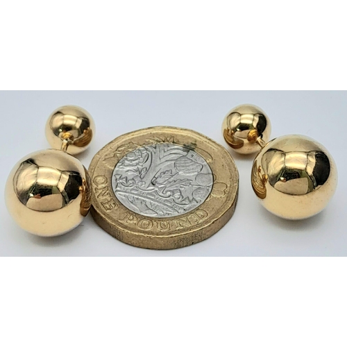 31 - A PAIR OF 9K YELLOW GOLD DOUBLE ENDED BALL STUD EARRINGS WITH SCREW ON FITTINGS. TOTAL WEIGHT 3.5G