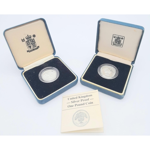 70 - 2X vintage fine silver Royal Mint one pound coins which commemorate the introduction of the English ... 