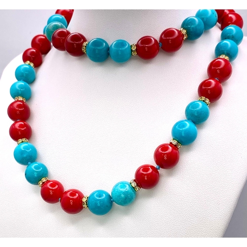 313 - An Eclectic Blue Turquoise and Red Coral Necklace. Gilded and white stone spacers. 12mm beads. 64cm ... 