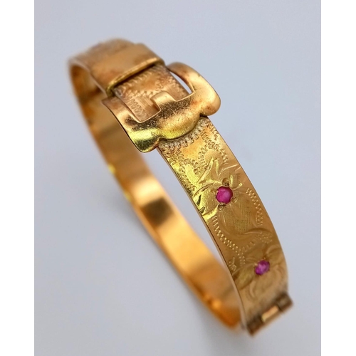 949 - A Vintage Fine Gold Hard Plated Ruby Set Buckle Design Hinge Bracelet.
6.3cm Inner width. Set with F... 