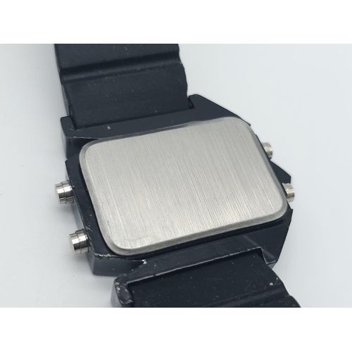 754 - An Unworn Men’s Modernist Design Digital Sports Quartz Watch. 50mm Case Width, Rubber Strap. Back Li... 