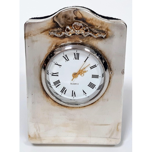 759 - A Hallmarked 2007 Silver Cased Easel Back Clock by Kitney & Co.
Silversmith. 7.5cm Tall. New Battery... 