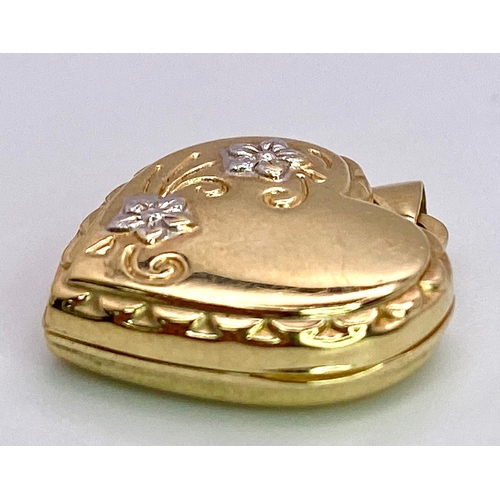 796 - A 9K YELLOW GOLD ENGRAVED HEART LOCKET, AS NEW.  2cm length, 1g total weight.