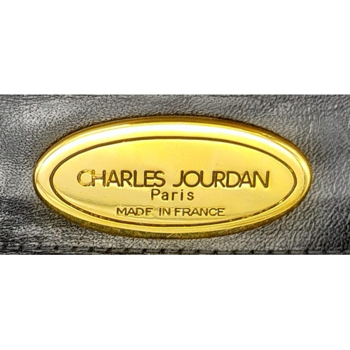 The Charles Jourdan Paris leather bag proudly made in France