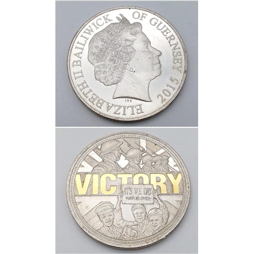 1196 - A Commemorative Sterling Silver £5 Coin to Celebrate Victory VE Day. 28.2g weight.