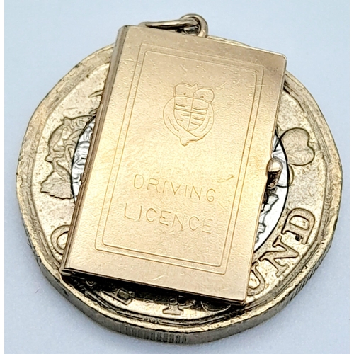 767 - 9k yellow gold Driving Licence charm/pendant, with original paperwork inside 2.3g