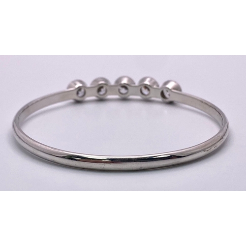 845 - Sterling Silver 5 Stone CZ Set Bangle. 14.3g. 5.5cm diameter. Ref: SH6483H.