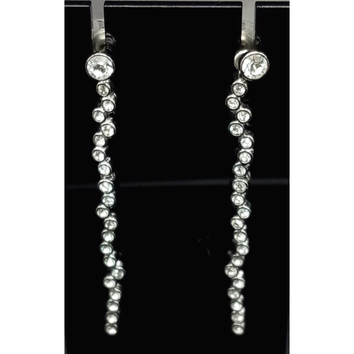 732 - Swarovski Impression Earrings and Necklace set  with detachable earrings that can be worn as a stud.... 