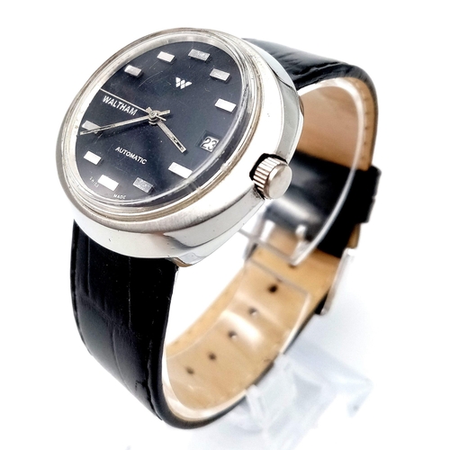 620 - A Rare Vintage Waltham Automatic Gents Watch. Black leather strap. Stainless steel oval case - 40mm.... 