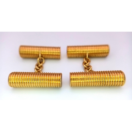 15 - A Pair of Theo Fennell Designer 18K Yellow Gold Cufflinks. Beautifully hand-crafted ridged cylinders... 