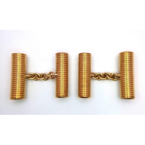 15 - A Pair of Theo Fennell Designer 18K Yellow Gold Cufflinks. Beautifully hand-crafted ridged cylinders... 