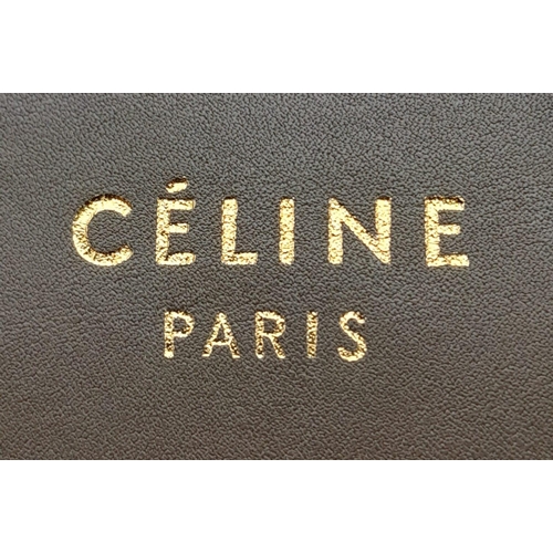 234 - A Celine Leather and Calf-Hair Tote/Luggage Bag. Orange and ivory trimmed calf-hair exterior with zi... 