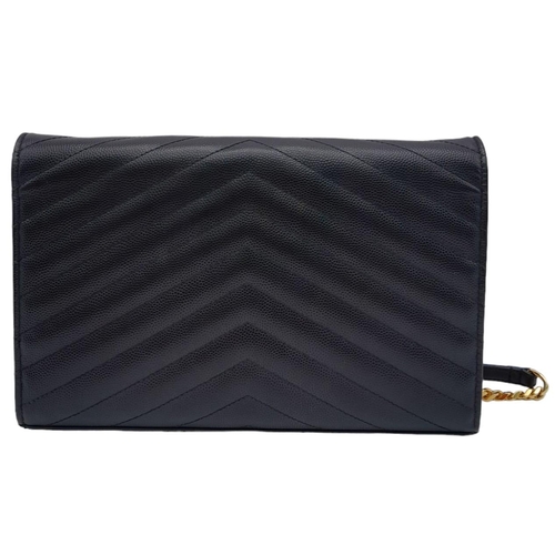 241 - A Saint Laurent Black Leather Flap Handbag. Decorative chevron exterior with gold furniture. YSL gol... 