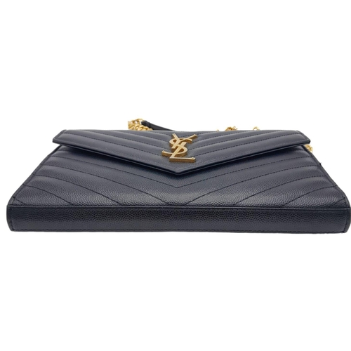 241 - A Saint Laurent Black Leather Flap Handbag. Decorative chevron exterior with gold furniture. YSL gol... 