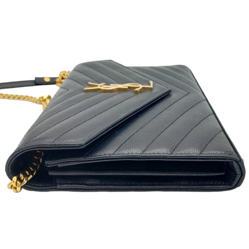 241 - A Saint Laurent Black Leather Flap Handbag. Decorative chevron exterior with gold furniture. YSL gol... 