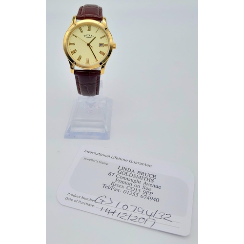 257 - A Men’s Gold Tone, Unworn, Rotary Date Watch Model GS10794/32. 38mm Including Crown. Replacement Bat... 