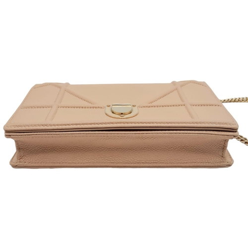 382 - A Christian Dior Blush Leather Small Handbag. Decorative leather with rose gold tone furniture. Zipp... 