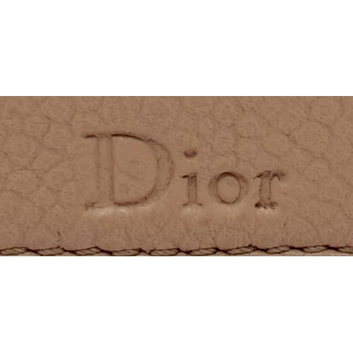 382 - A Christian Dior Blush Leather Small Handbag. Decorative leather with rose gold tone furniture. Zipp... 