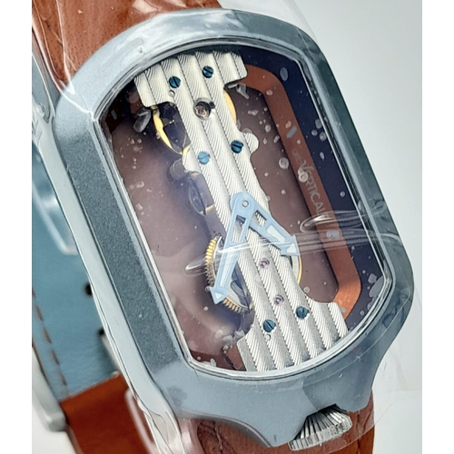 521 - A Verticale Skeleton Mechanical Watch. Brown leather strap. Rectangular ceramic case - 32mm. Skeleto... 