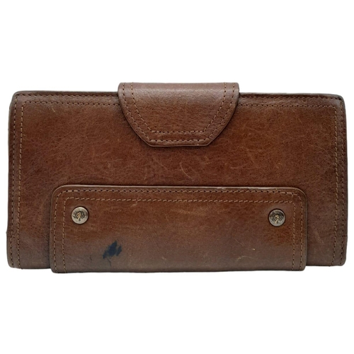 537 - A Brown Leather Mulberry Wallet. Exterior Fancy Buckle fastener. Plenty of interior space. 18cm x 10... 