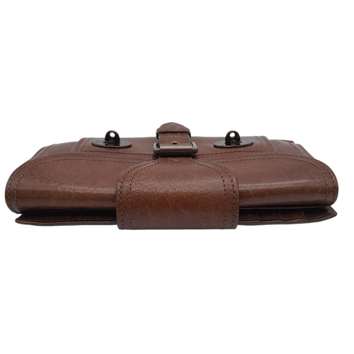 537 - A Brown Leather Mulberry Wallet. Exterior Fancy Buckle fastener. Plenty of interior space. 18cm x 10... 