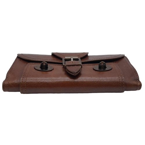 537 - A Brown Leather Mulberry Wallet. Exterior Fancy Buckle fastener. Plenty of interior space. 18cm x 10... 