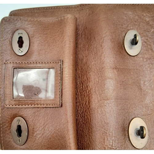 537 - A Brown Leather Mulberry Wallet. Exterior Fancy Buckle fastener. Plenty of interior space. 18cm x 10... 