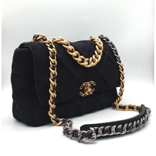 58 - A Chanel 19 Velvet Flap Hand/Shoulder Bag. Quilted velvet exterior with CC lock closure. Signature l... 