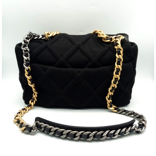 58 - A Chanel 19 Velvet Flap Hand/Shoulder Bag. Quilted velvet exterior with CC lock closure. Signature l... 