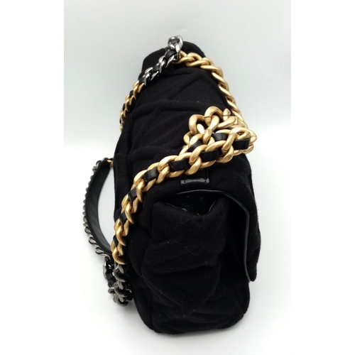 58 - A Chanel 19 Velvet Flap Hand/Shoulder Bag. Quilted velvet exterior with CC lock closure. Signature l... 