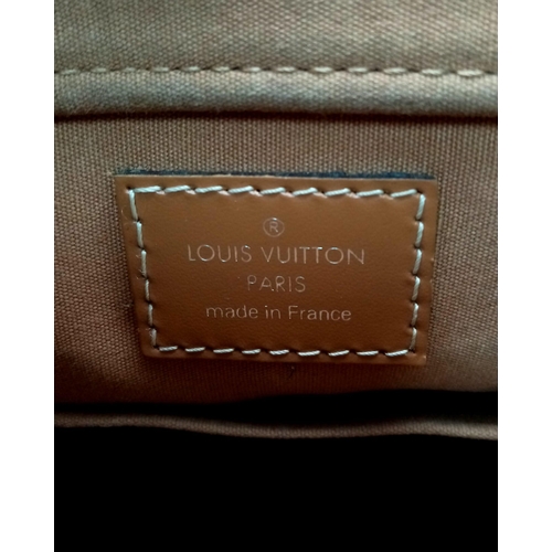 639 - A Camel Brown Louis Vuitton Shoulder Bag. Epi leather exterior with zipped compartment. Light brown ... 