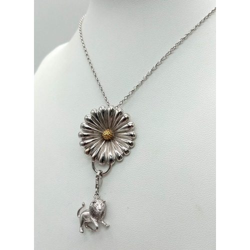 776 - A Sterling Silver and Yellow Gold Highlight Sunflower Pendant Necklace, with Lion Charm. 40cm Length... 