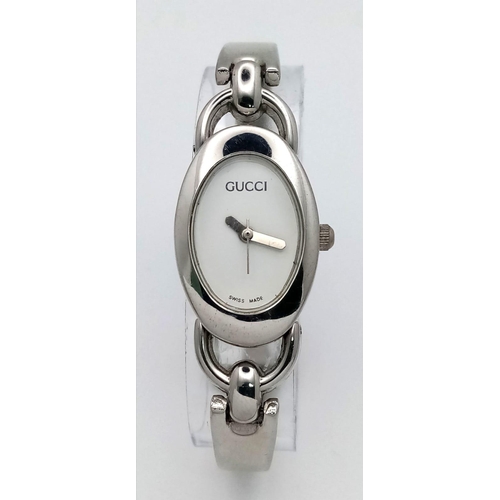 847 - A vintage Gucci Ladies Watch.
This delightful watch with 12mm oval dial is quality with a bracelet l... 